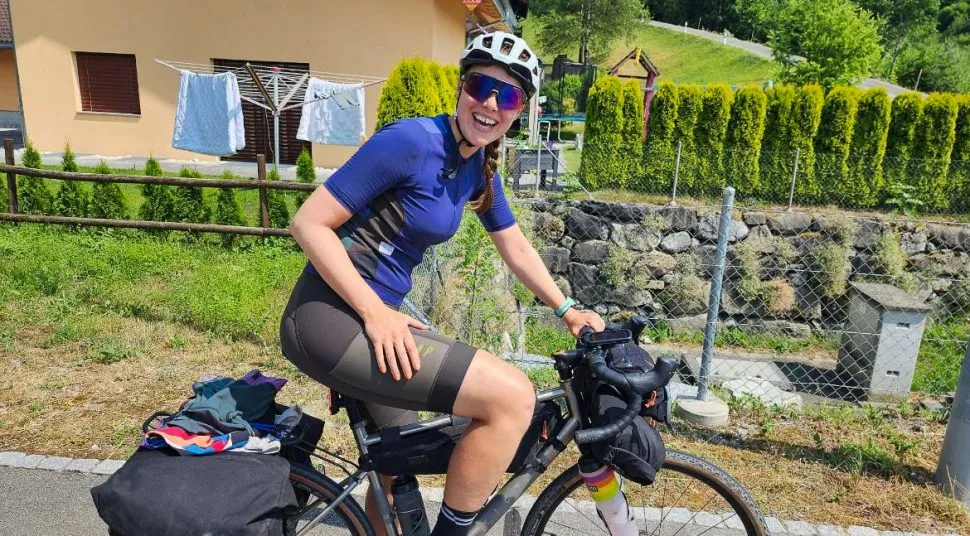 cyclist on bike with washing