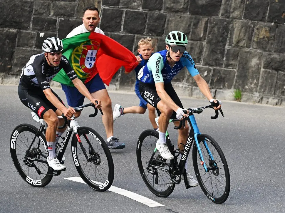 EMMETTEN, SWITZERLAND - JUNE 21: (L-R) Joao Almeida of Portugal and UAE Team Emirates - XRG - Black Points Jersey and Felix Gall of Austria and Team Decathlon AG2R La Mondiale compete in the breakaway during the 88th Tour de Suisse 2025, Stage 7 a 207.3km stage from Neuhausen am Rheinfall to Emmetten 755m / #UCIWT / on June 21, 2025 in Emmetten, Switzerland. (Photo by Tim de Waele/Getty Images)